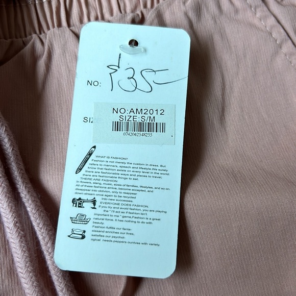 New with tags. Rose colored lightweight cargo wide leg pant. Elastic waist. - Picture 5 of 8